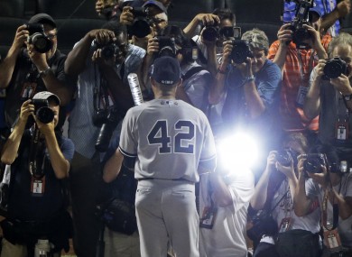 American League’s Mariano Rivera, of the New York Yankees, poses for photographers after the MLB All-Star baseball game last night.