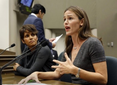 Jennifer Garner, right, and Halle Berry, left, testify in the California Capitol in Sacramento.