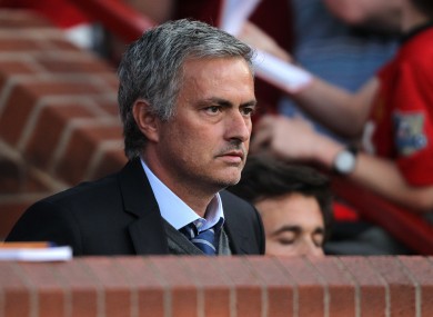 Jose Mourinho watches the game at Old Trafford last night.