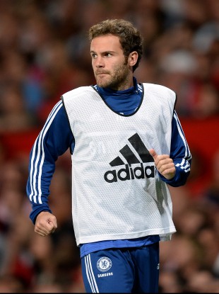 Mata warming up at Old Trafford on Monday.