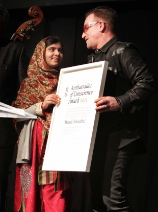 Malala on stage at the Mansion House this evening with Bono