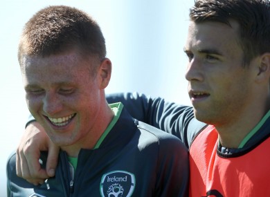 Sticking together: Everton's new signing James McCarthy is welcomed by Toffees team-mate Seamus Coleman.