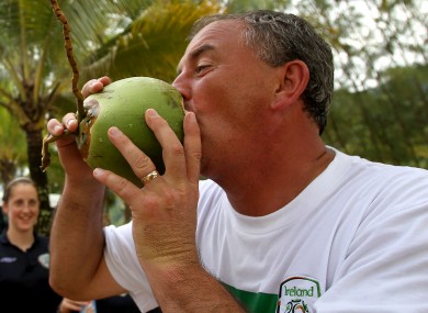 Noel King enjoys a coconut at Maracas Bay, Trinidad in 2010.