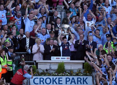 Dublin captain Stephen Cluxton raises the Sam Maguire trophy.