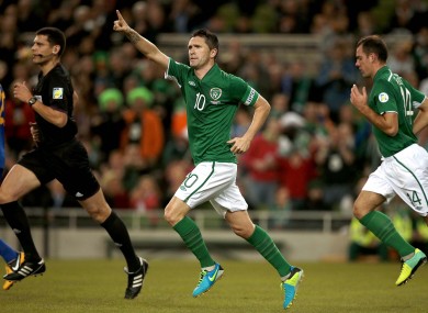 Keane celebrates scoring his 61st senior international goal.