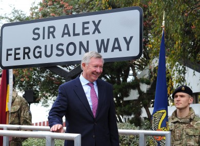 Sir Alex Ferguson unveils the street sign during a ceremony to mark the changing of the road name to Sir Alex Ferguson Way, Trafford.